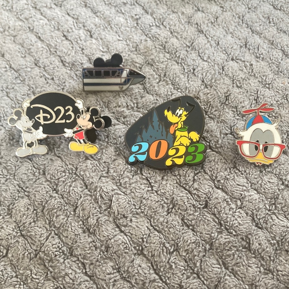 Disney D23 Collectible Pins Set - Black, Yellow, Blue, Red